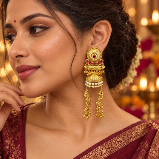 Indian woman wearing Ankkshi Kashmiri Mahal Dome Jhumka Earrings