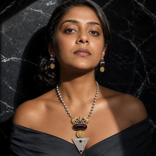 Indian woman wearing Ankkshi Simhika Oxidised Heritage Necklace Set - Ruby