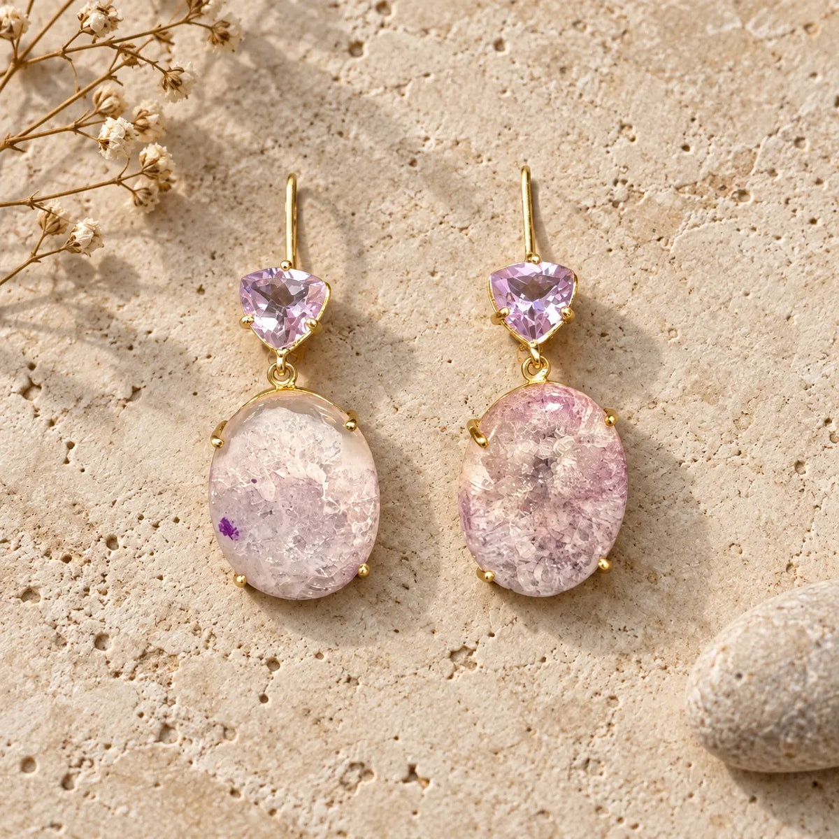 Faceted and raw-cut amethyst drop earrings in 18k gold plated settings. Handcrafted design from Ankkshi's Aakar collection.