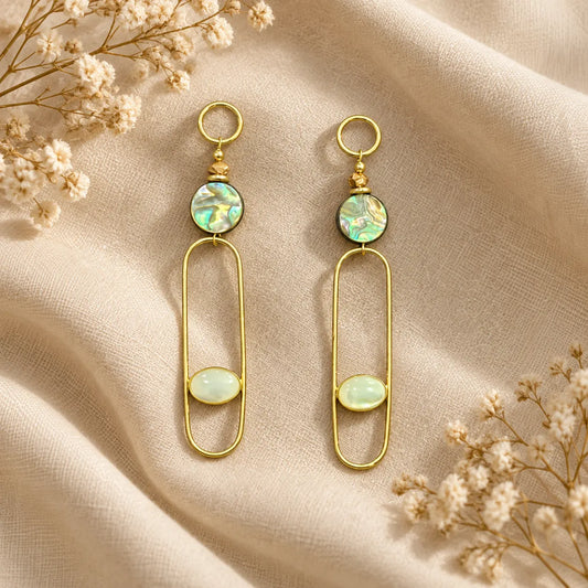 Elongated gold plated link earrings with an iridescent abalone shell disc and a pale pearlescent oval. Ankkshi's Aakar collection.