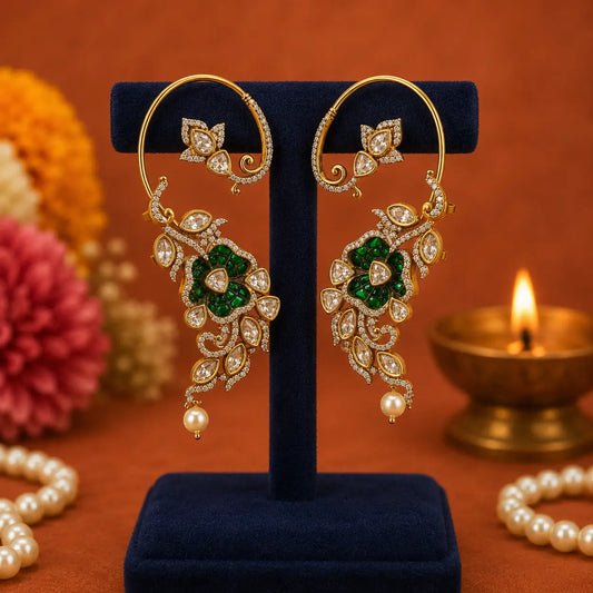 Ankkshi Kashmiri Gulmohar emerald ear cuff featuring kundan stones, emerald green accents, pearl drops and antique gold finish.