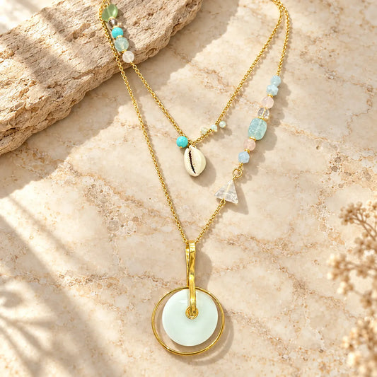 Layered necklace with genuine turquoise, rose quartz, aquamarine & cowrie shell charm. Handcrafted design from Ankkshi's Aakar collection.