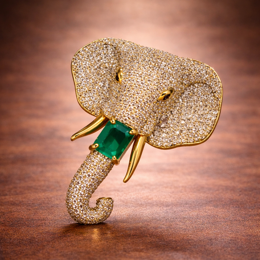 Diamond elephant head brooch with emerald center by Ankkshi